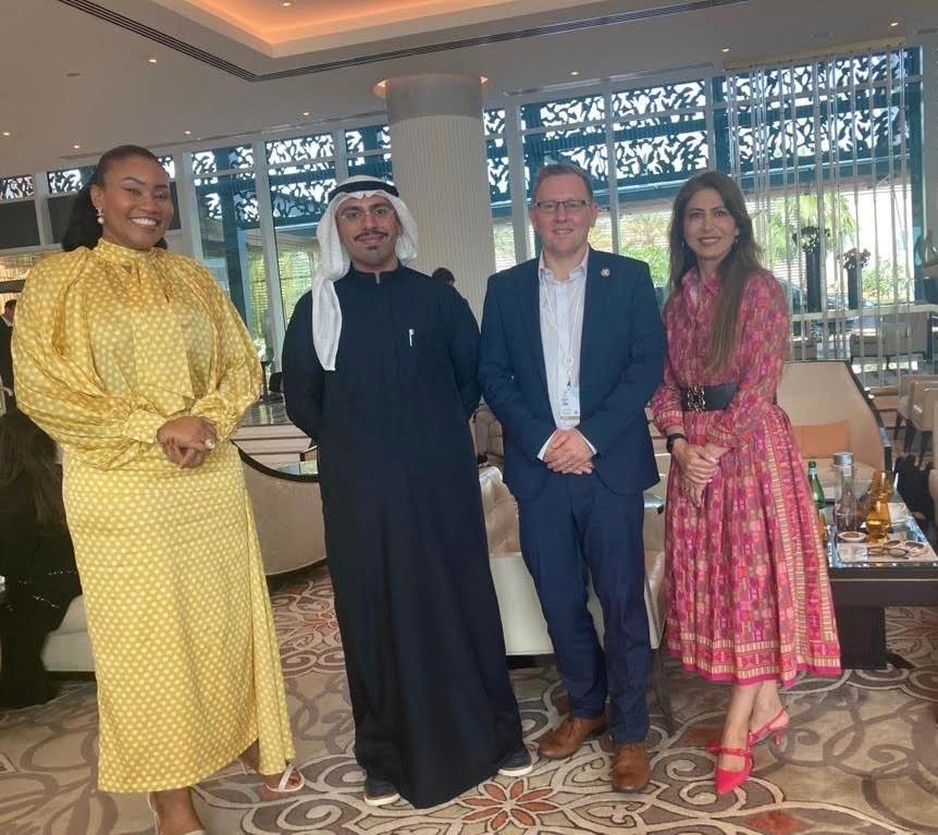 WHIS partners and community members meeting internationally